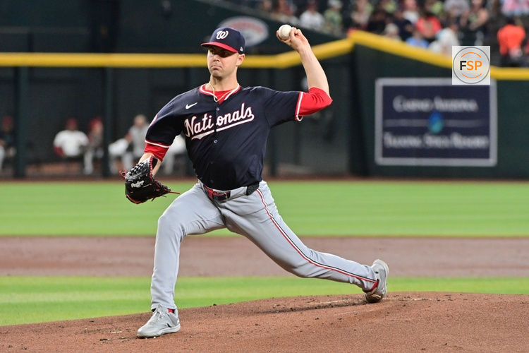 Jul 31, 2024; Phoenix, Arizona, USA;  Washington Nationals pitcher MacKenzie Gore (1) throws against the Arizona Diamondbacks in the first inning at Chase Field. Credit: Matt Kartozian-USA TODAY Sports