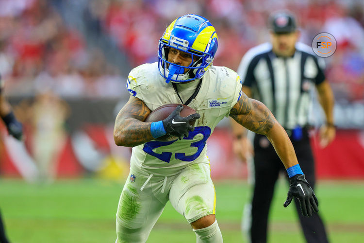 GLENDALE, AZ - NOVEMBER 26: Los Angeles Rams running back Kyren Williams (23) runs the ball for a gain during the Los Angeles Rams gave versus the Arizona Cardinals on November 26, 2023, at the State Farm Stadium in Glendale, AZ. (Photo by Jordon Kelly/Icon Sportswire)