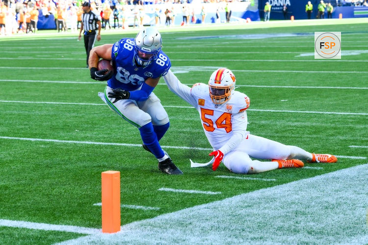 Oct 5, 2025; Seattle, Washington, USA; Seattle Seahawks tight end AJ Barner (88) breaks the arm tackle attempt by Tampa Bay Buccaneers outside linebacker Lavonte David (54) for a touchdown during the second half at Lumen Field. Credit: Steven Bisig-Imagn Images