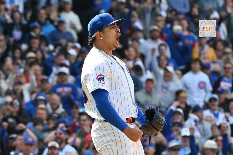 May 26, 2025; Chicago, Illinois, USA; Chicago Cubs relief pitcher Daniel Palencia (48) celebrates after defeating the Colorado Rockies at Wrigley Field. Credit: Patrick Gorski-Imagn Images