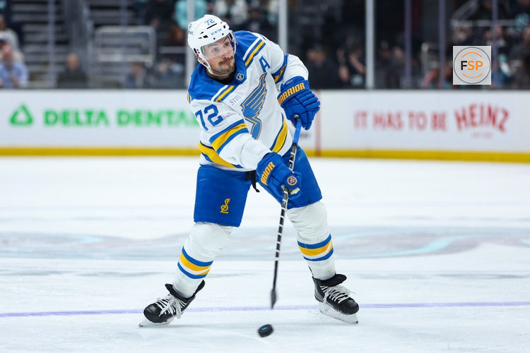 Mar 4, 2026; Seattle, Washington, USA; St. Louis Blues defenseman Justin Faulk (72) attempts a shot on goal in the first period against the Seattle Kraken at Climate Pledge Arena. Credit: Kevin Ng-Imagn Images