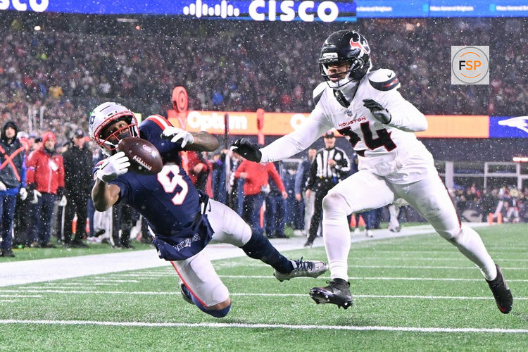 Jan 18, 2026; Foxborough, MA, USA; New England Patriots wide receiver Kayshon Boutte (9) catches the ball for a touchdown in the fourth quarter against the Houston Texans in an AFC Divisional Round game at Gillette Stadium. Credit: Brian Fluharty-Imagn Images