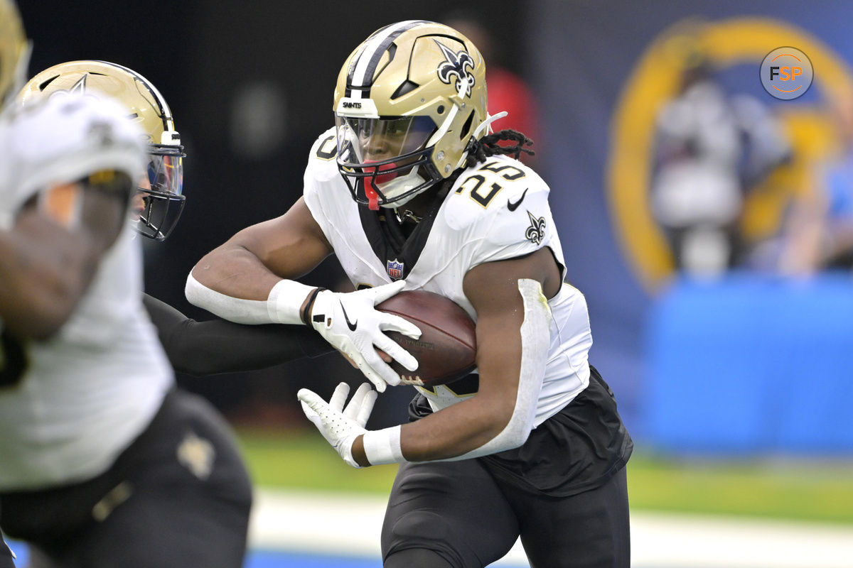 Oct 27, 2024; Inglewood, California, USA; New Orleans Saints running back Kendre Miller (25) carries the ball in the second half against the Los Angeles Chargers at SoFi Stadium. Credit: Jayne Kamin-Oncea-Imagn Images