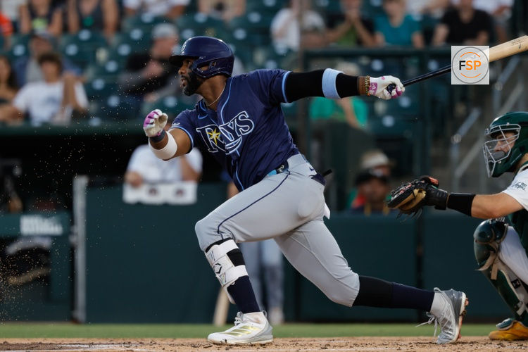Aug 12, 2025; West Sacramento, California, USA; Tampa Bay Rays first baseman Yandy Diaz (2) hits a single during the fourth inning against the Athletics at Sutter Health Park. Credit: Sergio Estrada-Imagn Images