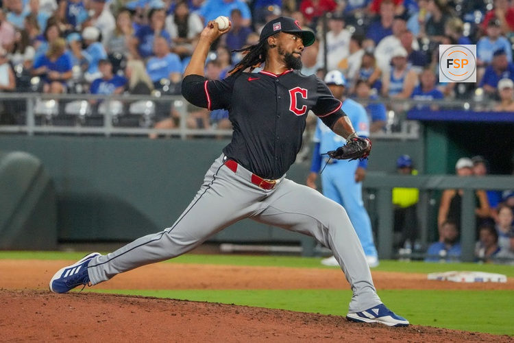 Jul 26, 2025; Kansas City, Missouri, USA; Cleveland Guardians relief pitcher Emmanuel Clase (48) delivers a pitch against the Kansas City Royals in the ninth inning at Kauffman Stadium. Credit: Denny Medley-Imagn Images