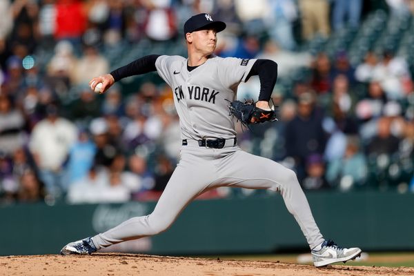 May 25, 2025; Denver, Colorado, USA; New York Yankees relief pitcher Luke Weaver (30) pitches in the ninth inning against the Colorado Rockies at Coors Field. Mandatory Credit: Isaiah J. Downing-Imagn Images