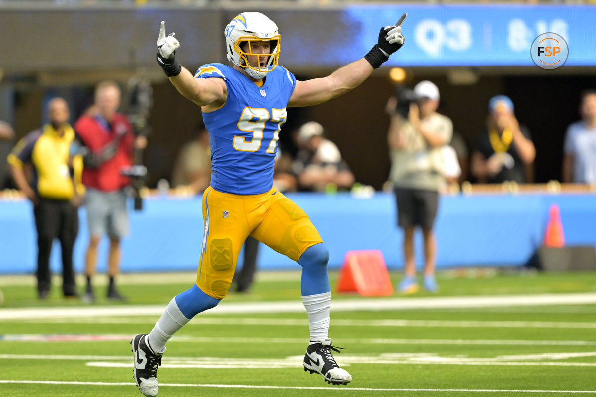 Sep 8, 2024; Inglewood, California, USA;  Los Angeles Chargers linebacker Joey Bosa (97) celebrates after forcing a fumble in the second half against the Las Vegas Raiders at SoFi Stadium. Credit: Jayne Kamin-Oncea-Imagn Images