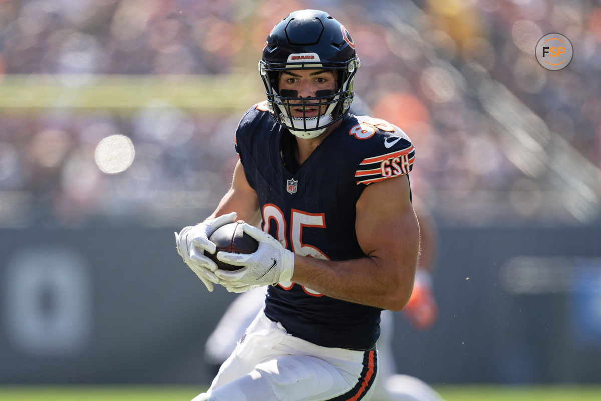 Oct 1, 2023; Chicago, Illinois, USA;  Chicago Bears tight end Cole Kmet (85) runs with the ball against the Denver Broncos at Soldier Field. Credit: Jamie Sabau-USA TODAY Sports