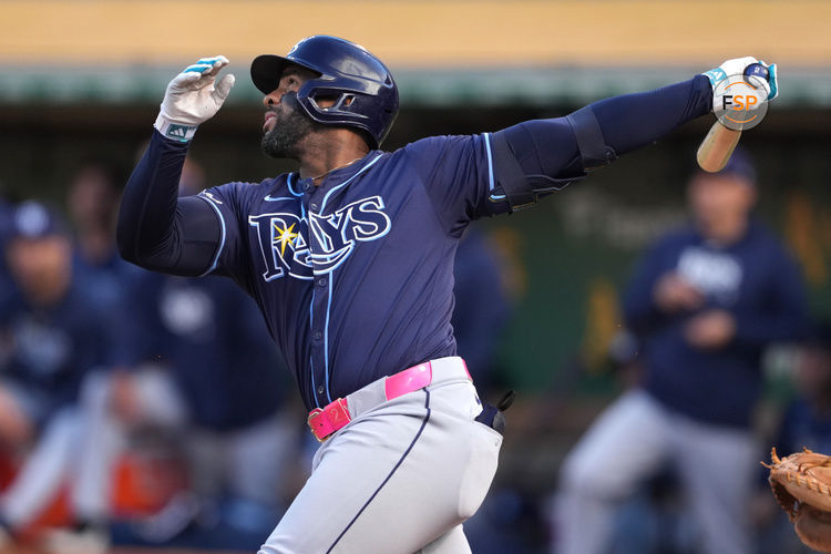 Aug 21, 2024; Oakland, California, USA; Tampa Bay Rays first baseman Yandy Diaz (2) bats against the Oakland Athletics during the first inning at Oakland-Alameda County Coliseum. Credit: Darren Yamashita-USA TODAY Sports