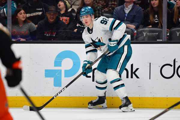 Dec 29, 2025; Anaheim, California, USA; San Jose Sharks left wing Igor Chernyshov (92) controls the puck against the Anaheim Ducks during the third period at Honda Center. Mandatory Credit: Gary A. Vasquez-Imagn Images