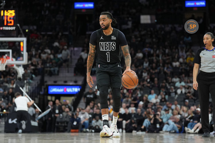 Mar 4, 2025; San Antonio, Texas, USA;  Brooklyn Nets guard D'Angelo Russell (1) dribbles in the second half against the San Antonio Spurs at Frost Bank Center. Credit: Daniel Dunn-Imagn Images