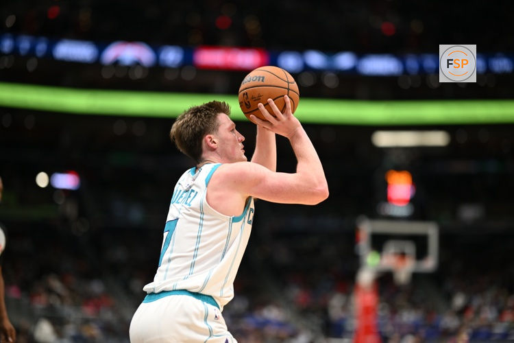 Oct 26, 2025; Washington, District of Columbia, USA; Charlotte Hornets guard Kon Knueppel (7) attempts.a shot against the Washington Wizards during the third quarter at Capital One Arena. Credit: Rafael Suanes-Imagn Images