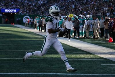 Oct 25, 2026; East Rutherford, New Jersey, USA;  New York Jets wide receiver Omar Cooper Jr. (11) scores a touchdown during the second half against the Miami Dolphins at MetLife Stadium.  Mandatory Credit: Robert Deutsch-Imagn Images