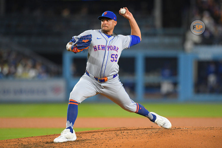 LOS ANGELES, CA - APRIL 19: New York Mets pitcher Sean Manaea (59) throws a pitch during the MLB game between the New York Mets and the Los Angeles Dodgers on April 19, 2024 at Dodger Stadium in Los Angeles, CA. (Photo by Brian Rothmuller/Icon Sportswire)