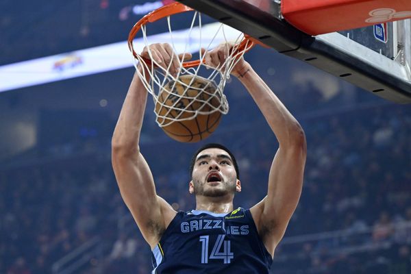 Nov 15, 2025; Cleveland, Ohio, USA; Memphis Grizzlies center Zach Edey (14) dunks in the first quarter against the Cleveland Cavaliers at Rocket Arena. Mandatory Credit: David Richard-Imagn Images
