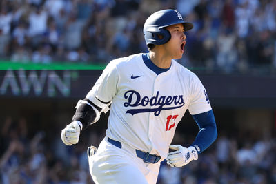 Sep 22, 2024; Los Angeles, California, USA;  Los Angeles Dodgers designated hitter Shohei Ohtani (17) celebrates on a game tying solo home run during the ninth inning against the Colorado Rockies at Dodger Stadium. Mandatory Credit: Kiyoshi Mio-Imagn Images