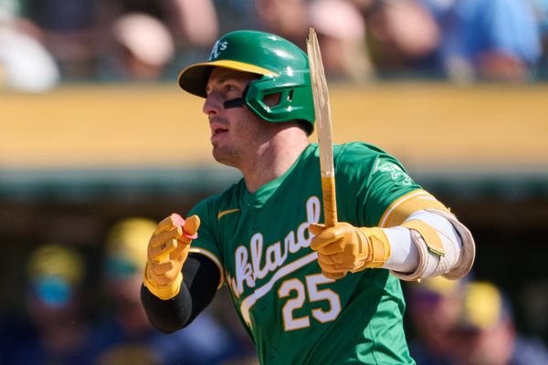 Aug 24, 2024; Oakland, California, USA; Oakland Athletics outfielder Brent Rooker (25) breaks his bat against the Milwaukee Brewers during the the ninth inning at Oakland-Alameda County Coliseum. Mandatory Credit: Robert Edwards-USA TODAY Sports