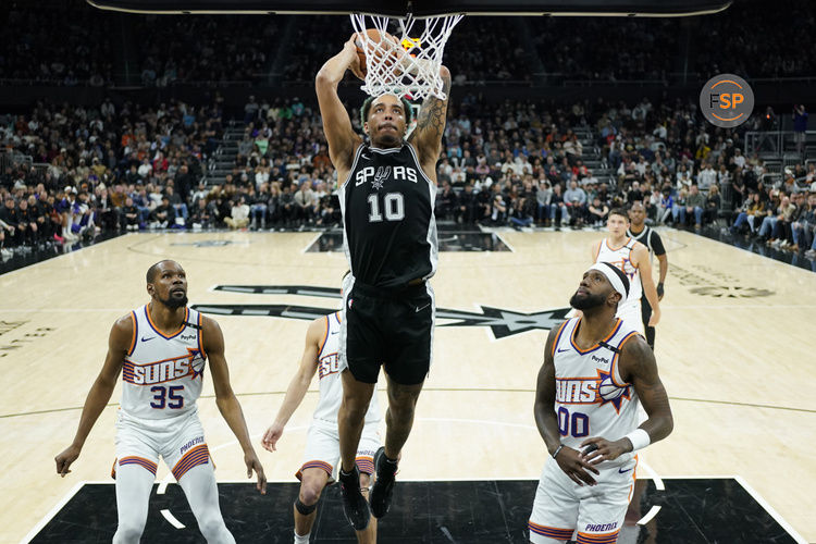 Feb 20, 2025; Austin, Texas, USA; San Antonio Spurs forward Jeremy Sochan (10) dunks during the second half against the Phoenix Suns at Moody Center. Credit: Scott Wachter-Imagn Images