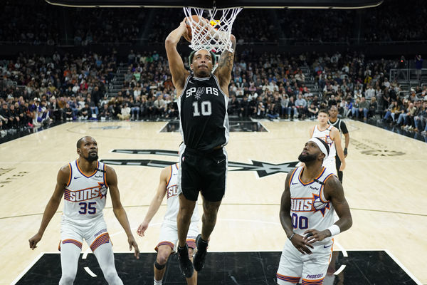 Feb 20, 2025; Austin, Texas, USA; San Antonio Spurs forward Jeremy Sochan (10) dunks during the second half against the Phoenix Suns at Moody Center. Mandatory Credit: Scott Wachter-Imagn Images