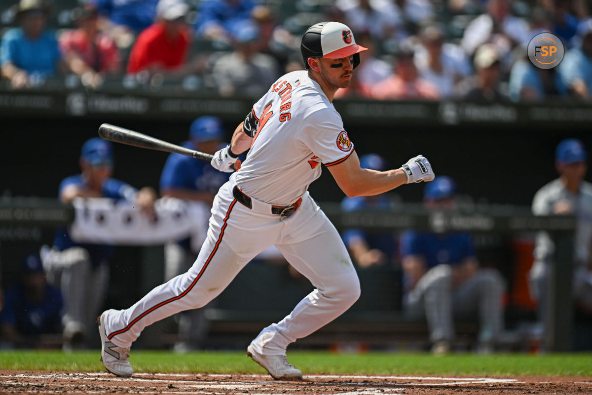 Jul 29, 2024; Baltimore, Maryland, USA; Baltimore Orioles third baseman Jordan Westburg (11) hits a single during the first inning against the Toronto Blue Jays at Oriole Park at Camden Yards. Credit: Reggie Hildred-USA TODAY Sports