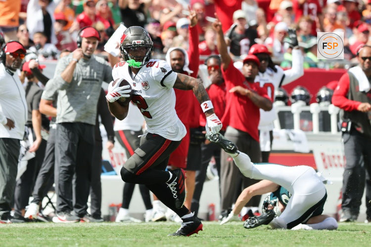Sep 28, 2025; Tampa, Florida, USA; Tampa Bay Buccaneers wide receiver Emeka Egbuka (2) runs the ball during the second half against the Philadelphia Eagles  at Raymond James Stadium. Credit: Kim Klement Neitzel-Imagn Images