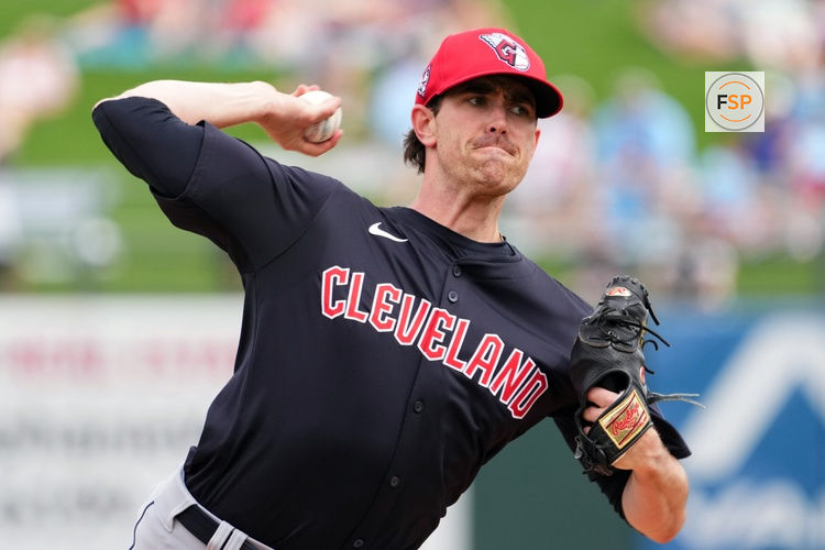 Mar 12, 2024; Surprise, Arizona, USA; Cleveland Guardians starting pitcher Shane Bieber (57) bats against the Texas Rangers during the second inning at Surprise Stadium. Credit: Joe Camporeale-USA TODAY Sports