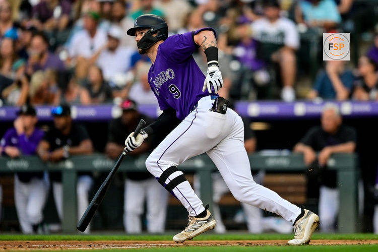 DENVER, CO - JULY 5: Colorado Rockies center fielder Brenton Doyle (9) hits a fourth inning single during a game between the Kansas City Royals and the Colorado Rockies at Coors Field on July 5, 2024 in Denver, Colorado. (Photo by Dustin Bradford/Icon Sportswire)