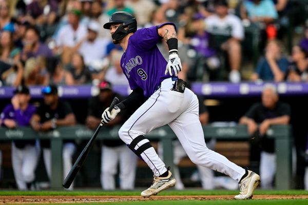 DENVER, CO - JULY 5: Colorado Rockies center fielder Brenton Doyle (9) hits a fourth inning single during a game between the Kansas City Royals and the Colorado Rockies at Coors Field on July 5, 2024 in Denver, Colorado. (Photo by Dustin Bradford/Icon Sportswire)
