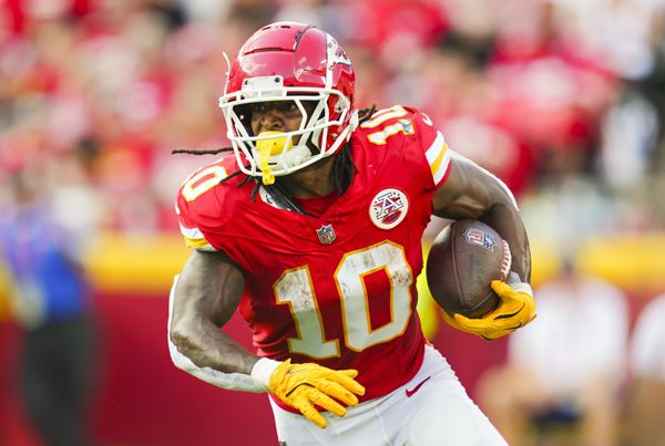 Sep 15, 2024; Kansas City, Missouri, USA; Kansas City Chiefs running back Isiah Pacheco (10) runs the ball during the first half against the Cincinnati Bengals at GEHA Field at Arrowhead Stadium. Mandatory Credit: Jay Biggerstaff-Imagn Images