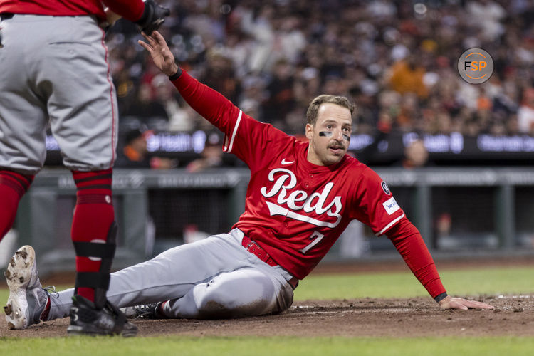 Apr 8, 2025; San Francisco, California, USA;  Cincinnati Reds designated hitter Spencer Steer (7) reacts after being tagged out at home plate by San Francisco Giants catcher Sam Huff (23) during the fifth inning at Oracle Park. Credit: John Hefti-Imagn Images
