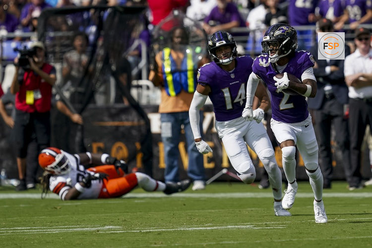 Sep 14, 2025; Baltimore, Maryland, USA; Baltimore Ravens cornerback Nate Wiggins (2) completes an interception during the third quarter at M&T Bank Stadium. Credit: Mitch Stringer-Imagn Images