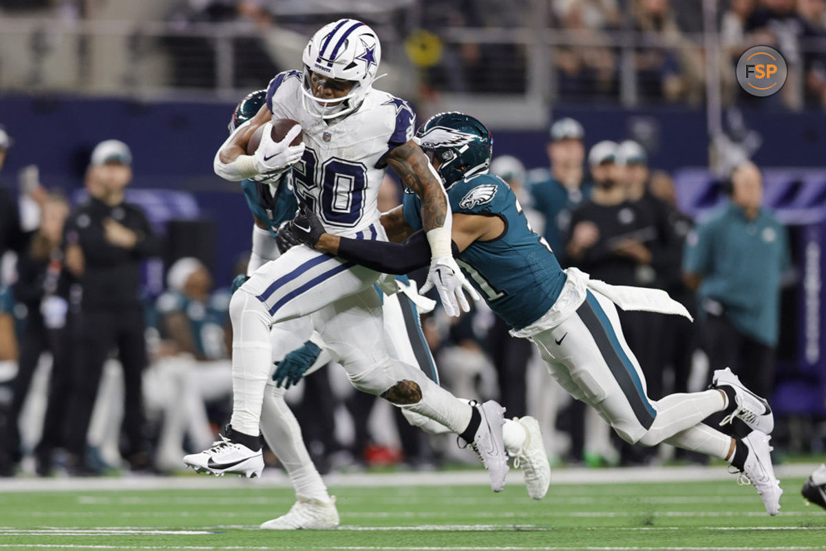 ARLINGTON, TX - DECEMBER 10: Dallas Cowboys running back Tony Pollard (20) runs for a first down from Philadelphia Eagles safety Kevin Byard (31) during the game between the Dallas Cowboys and the Philadelphia Eagles on December 10, 2023 at AT&T Stadium in Arlington, Texas. (Photo by Matthew Pearce/Icon Sportswire)