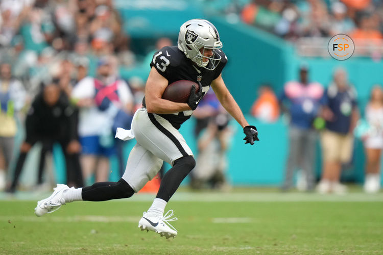 MIAMI GARDENS, FL - NOVEMBER 19: Las Vegas Raiders wide receiver Hunter Renfrow (13) runs after a catch during the game between the Las Vegas Raiders and the Miami Dolphins on Sunday, November 19, 2023 at Hard Rock Stadium, Miami, Fla. (Photo by Peter Joneleit/Icon Sportswire)