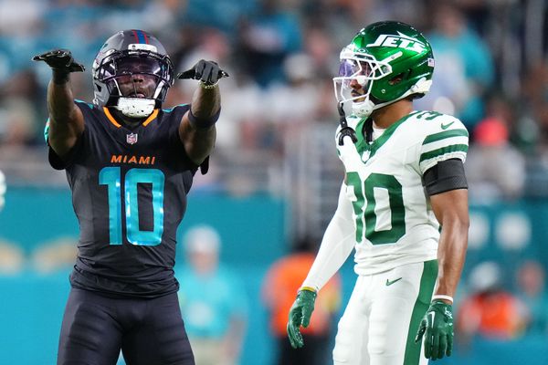 Sep 29, 2025; Miami Gardens, Florida, USA; Miami Dolphins wide receiver Tyreek Hill (10) reacts after a play against the New York Jets during the first half at Hard Rock Stadium. Mandatory Credit: Rich Storry-Imagn Images