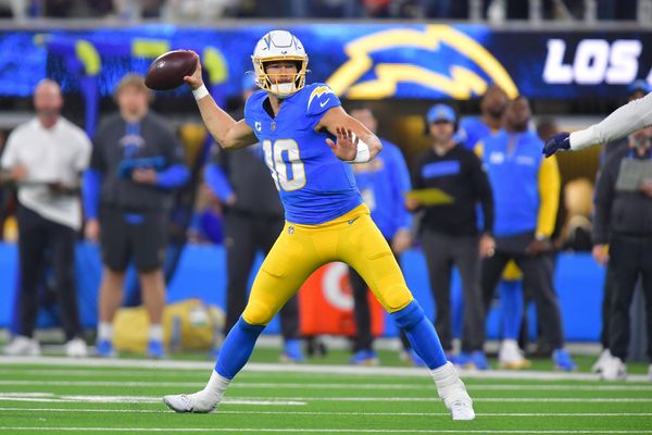 Dec 19, 2024; Inglewood, California, USA; Los Angeles Chargers quarterback Justin Herbert (10) throws against the Denver Broncos during the second half at SoFi Stadium. Mandatory Credit: Gary A. Vasquez-Imagn Images