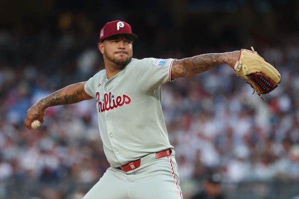 Jul 25, 2025; Bronx, New York, USA; Philadelphia Phillies relief pitcher Taijuan Walker (99) delivers a pitch during the second inning against the New York Yankees at Yankee Stadium. Mandatory Credit: Vincent Carchietta-Imagn Images