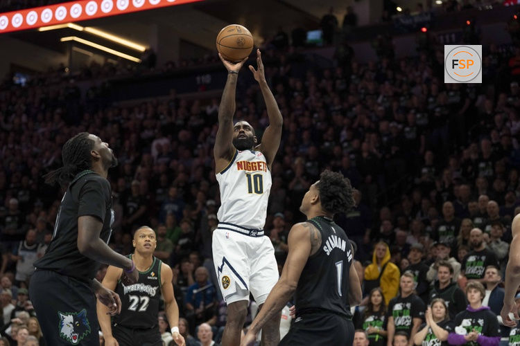 Apr 30, 2026; Minneapolis, Minnesota, USA; Denver Nuggets guard Tim Hardaway Jr. (10) shoots the ball against the Minnesota Timberwolves in the second half during game six of the first round of the 2026 NBA Playoffs at Target Center. Credit: Jesse Johnson-Imagn Images