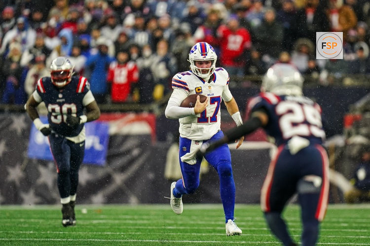 Dec 14, 2025; Foxborough, Massachusetts, USA; Buffalo Bills quarterback Josh Allen (17) runs the ball against the New England Patriots in the second half at Gillette Stadium. Credit: David Butler II-Imagn Images
