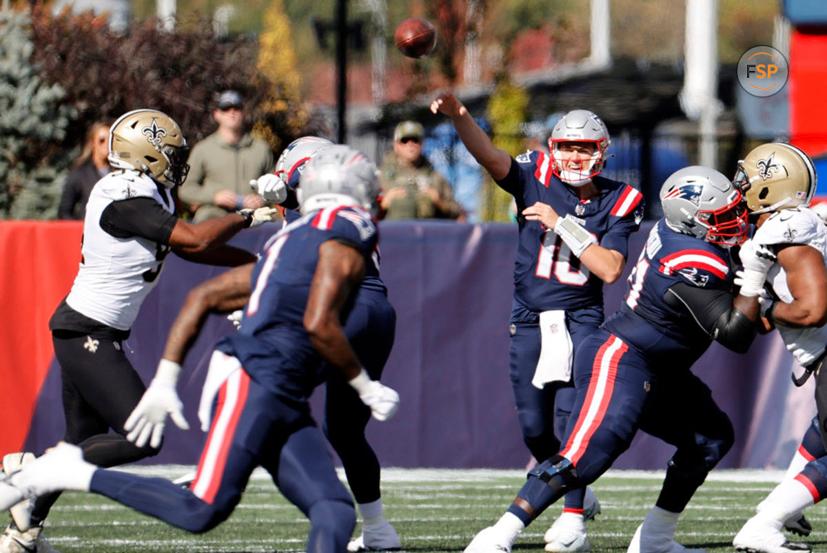 FOXBOROUGH, MA - OCTOBER 08: New England Patriots quarterback Mac Jones (10) airs it out during a game between the New England Patriots and the New Orleans Saints on October 8, 2023, at Gillette Stadium in Foxborough, Massachusetts. (Photo by Fred Kfoury III/Icon Sportswire)