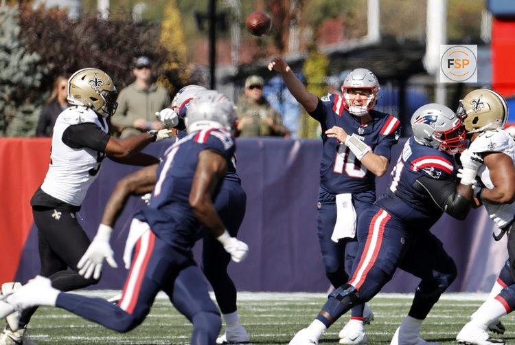 FOXBOROUGH, MA - OCTOBER 08: New England Patriots quarterback Mac Jones (10) airs it out during a game between the New England Patriots and the New Orleans Saints on October 8, 2023, at Gillette Stadium in Foxborough, Massachusetts. (Photo by Fred Kfoury III/Icon Sportswire)