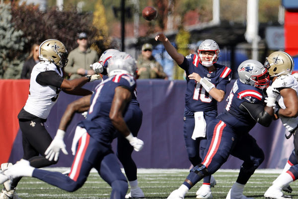 FOXBOROUGH, MA - OCTOBER 08: New England Patriots quarterback Mac Jones (10) airs it out during a game between the New England Patriots and the New Orleans Saints on October 8, 2023, at Gillette Stadium in Foxborough, Massachusetts. (Photo by Fred Kfoury III/Icon Sportswire)