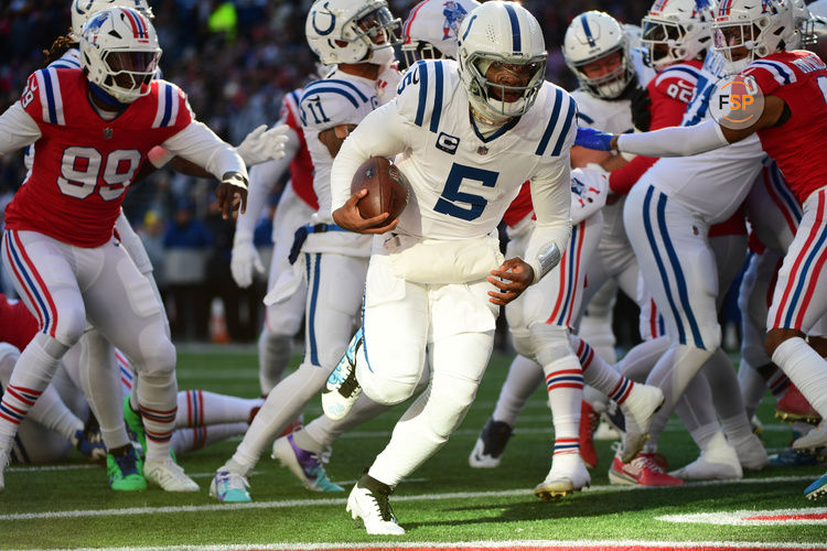 Dec 1, 2024; Foxborough, Massachusetts, USA;  Indianapolis Colts quarterback Anthony Richardson (5) runs the ball for a touchdown during the first half against the New England Patriots at Gillette Stadium. Credit: Bob DeChiara-Imagn Images