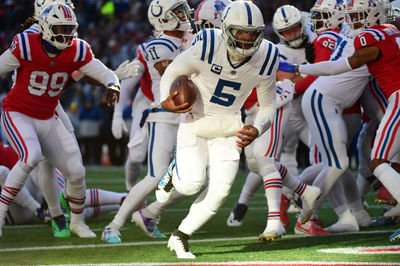 Dec 1, 2024; Foxborough, Massachusetts, USA;  Indianapolis Colts quarterback Anthony Richardson (5) runs the ball for a touchdown during the first half against the New England Patriots at Gillette Stadium. Mandatory Credit: Bob DeChiara-Imagn Images