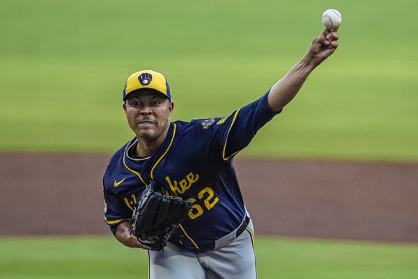 Aug 6, 2025; Cumberland, Georgia, USA; Milwaukee Brewers pitcher Jose Quintana (62) pitches against the Atlanta Braves during the first inning at Truist Park. Mandatory Credit: Dale Zanine-Imagn Images
