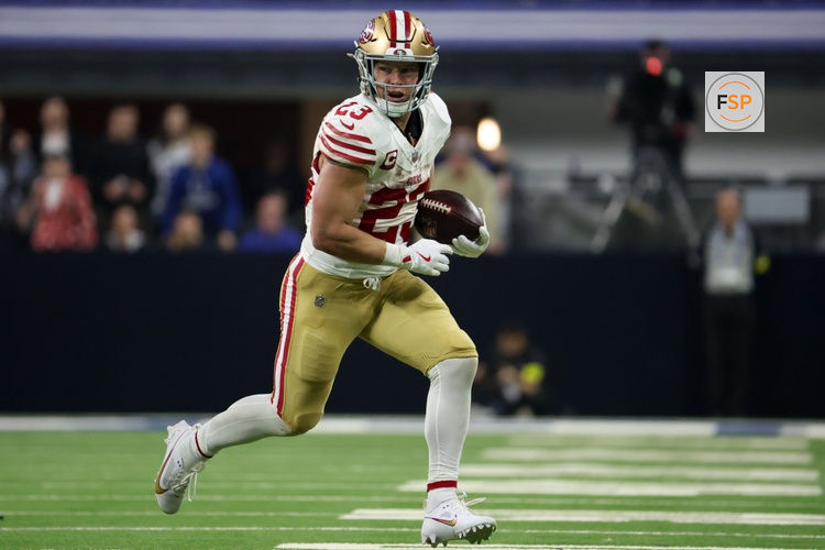 Dec 22, 2025; Indianapolis, Indiana, USA; San Francisco 49ers running back Christian McCaffrey (23) carries the ball against the Indianapolis Colts in the fourth quarter of the game at Lucas Oil Stadium. Credit: Trevor Ruszkowski-Imagn Images