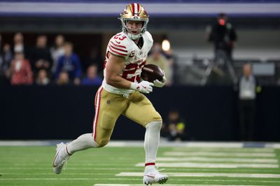 Dec 22, 2025; Indianapolis, Indiana, USA; San Francisco 49ers running back Christian McCaffrey (23) carries the ball against the Indianapolis Colts in the fourth quarter of the game at Lucas Oil Stadium. Mandatory Credit: Trevor Ruszkowski-Imagn Images