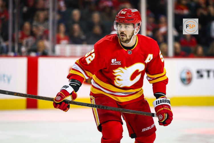 Jan 23, 2026; Calgary, Alberta, CAN; Calgary Flames defenseman MacKenzie Weegar (52) against the Washington Capitals during the second period at Scotiabank Saddledome. Credit: Sergei Belski-Imagn Images