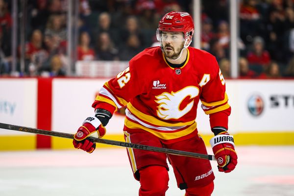 Jan 23, 2026; Calgary, Alberta, CAN; Calgary Flames defenseman MacKenzie Weegar (52) against the Washington Capitals during the second period at Scotiabank Saddledome. Mandatory Credit: Sergei Belski-Imagn Images