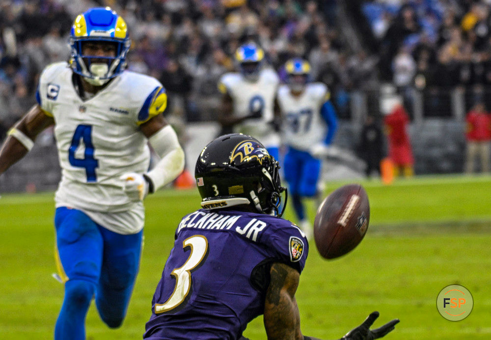 BALTIMORE, MD - DECEMBER 10:  Baltimore Ravens wide receiver Odell Beckham Jr. (3) catches a touchdown  pass against Los Angeles Rams safety Jordan Fuller (4) during the Los Angeles Rams game versus the Baltimore Ravens on December 10, 2023 at M&T Bank Stadium in Baltimore, MD.  (Photo by Mark Goldman/Icon Sportswire)
