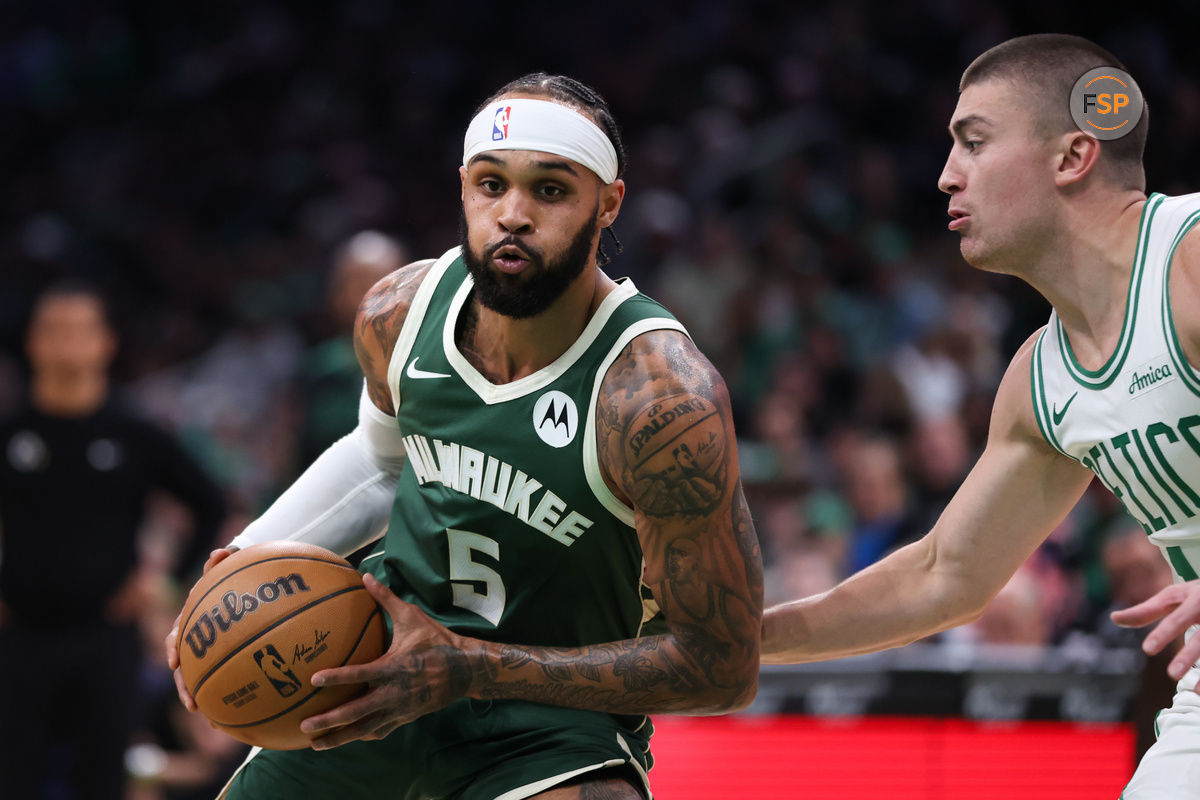 Oct 28, 2024; Boston, Massachusetts, USA; Milwaukee Bucks guard Gary Trent Jr (5) drives to the basket during the first half against the Boston Celtics at TD Garden. Credit: Paul Rutherford-Imagn Images